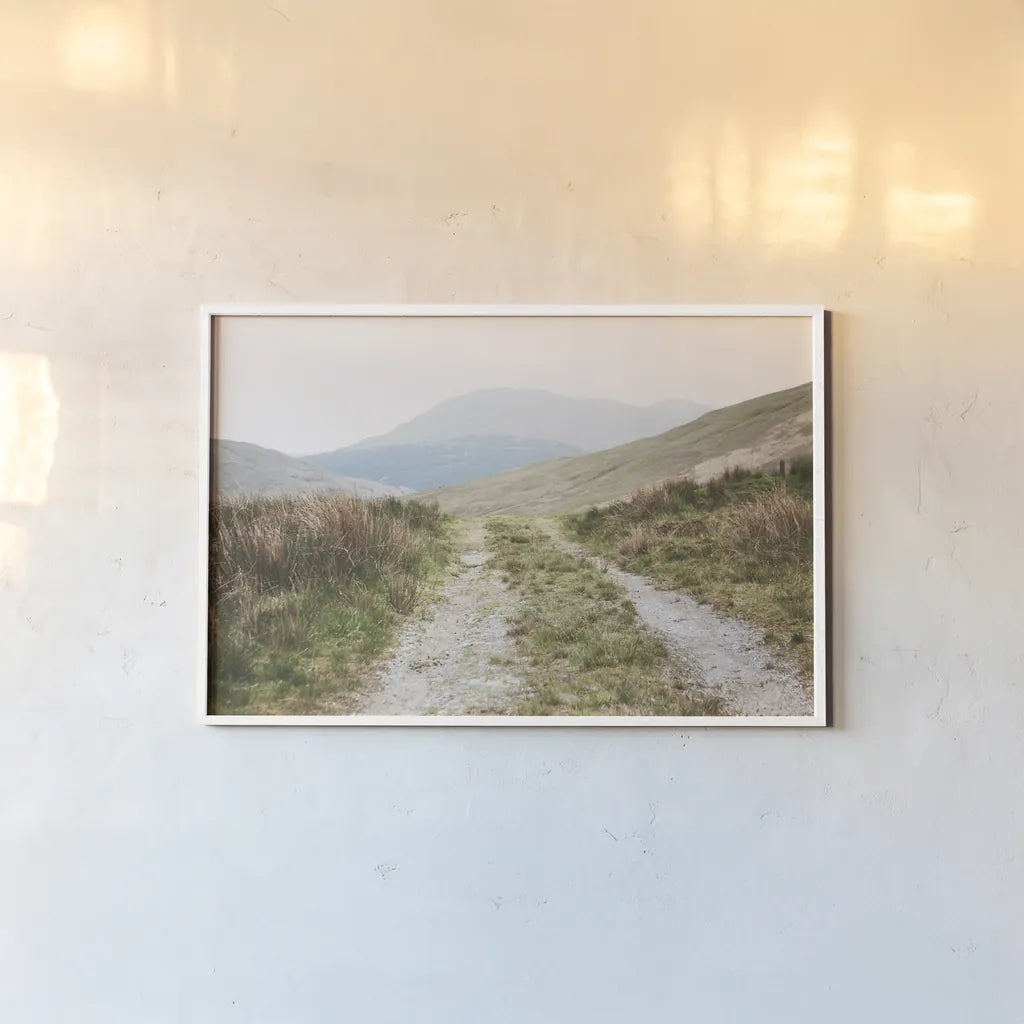 Scottish Highlands I by Laura Marshall. shown as a paper print in a white frame. Available as a archival giclee rolled canvas, fine art paper, or poster print. SKU 63275i.