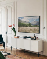 Scottish Highlands III by Laura Marshall. shown as a framed stretched canvas in a living room above a console. Available as a archival giclee rolled canvas, fine art paper, or poster print. SKU 63277i.