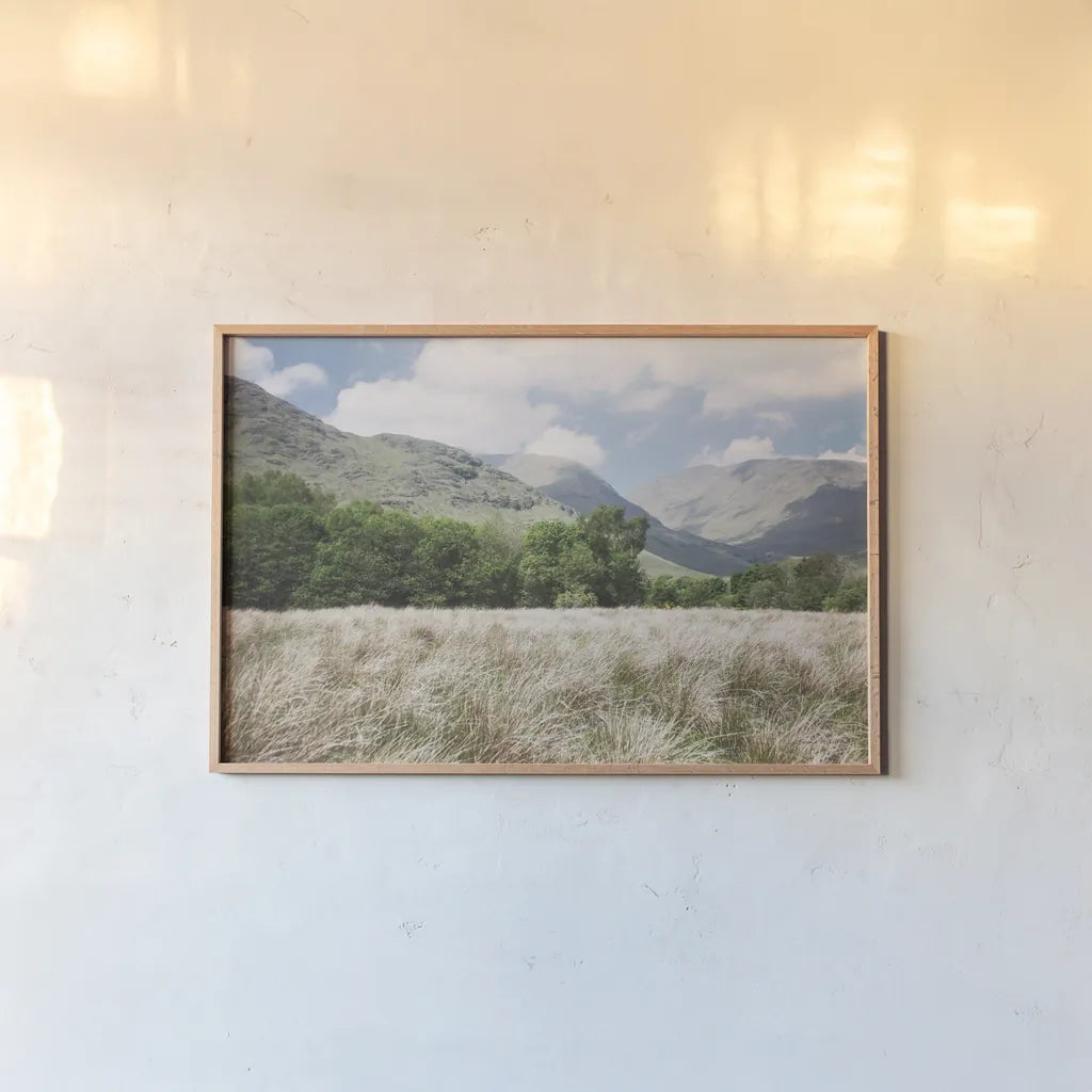 Scottish Highlands III by Laura Marshall. shown as a paper print in a natural frame. Available as a archival giclee rolled canvas, fine art paper, or poster print. SKU 63277i.