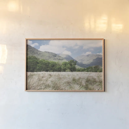 Scottish Highlands III by Laura Marshall. shown as a paper print in a natural frame. Available as a archival giclee rolled canvas, fine art paper, or poster print. SKU 63277i.