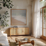 Serene Sea II by Laura Marshall. Shown in a natural wood frame in a cozy modern living room. Available as an archival giclee rolled canvas, fine art paper, or poster print. SKU 39640a.
