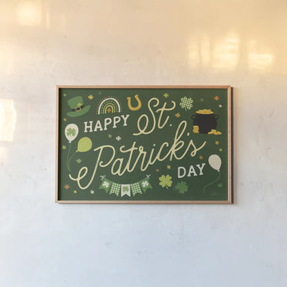 Shamrock Wishes I by Laura Marshall. shown as a paper print in a natural frame. Available as a archival giclee rolled canvas, fine art paper, or poster print. SKU 83885i.