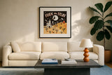 Spooky Village III by Laura Marshall. Displayed in a glass frame with matte in a clean modern living room. Available as an archival giclee rolled canvas, fine art paper, or poster print. SKU 48106a.