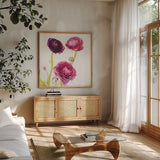 Spring Ranunculus I by Laura Marshall. Shown in a natural wood frame in a cozy modern living room. Available as an archival giclee rolled canvas, fine art paper, or poster print. SKU 25097a.