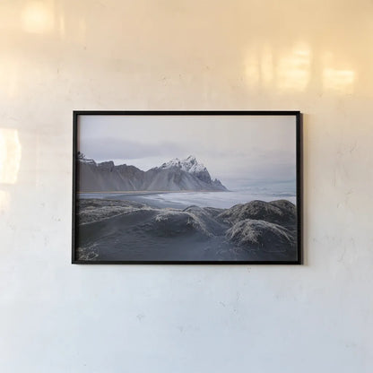 Stokksnes by Laura Marshall. shown as a paper print in a black flame. Available as a archival giclee rolled canvas, fine art paper, or poster print. SKU 53677i.