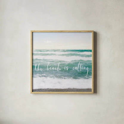 The Beach is Calling by Laura Marshall. Shown in a natural wood glass frame for a timeless modern aesthetic. Available as an archival giclee rolled canvas, fine art paper, or poster print. SKU 21117a.