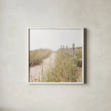To the Beach by Laura Marshall. Shown in a crisp white glass frame for a clean and minimalist style. Available as an archival giclee rolled canvas, fine art paper, or poster print. SKU 38776a.