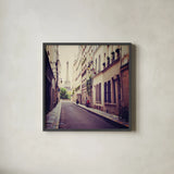 Tour Eiffel by Laura Marshall. Shown in a sleek black glass frame for a contemporary gallery look. Available as an archival giclee rolled canvas, fine art paper, or poster print. SKU 21921a.