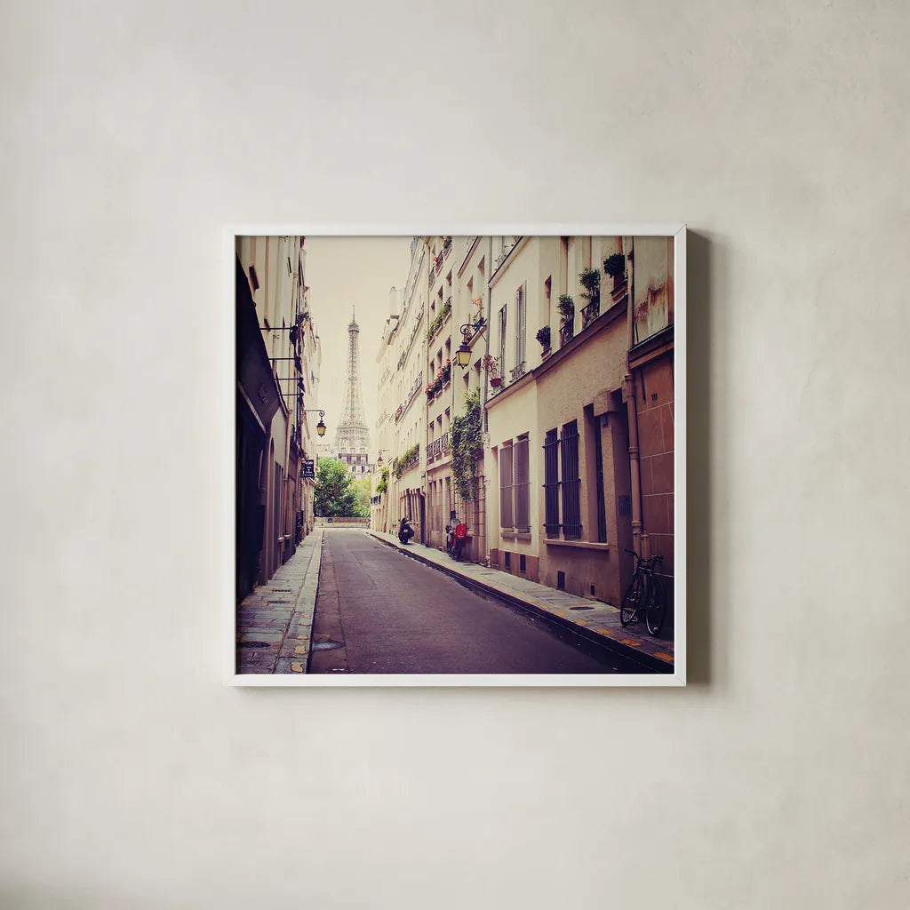 Tour Eiffel by Laura Marshall. Shown in a crisp white glass frame for a clean and minimalist style. Available as an archival giclee rolled canvas, fine art paper, or poster print. SKU 21921a.