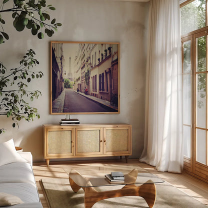 Tour Eiffel by Laura Marshall. Shown in a natural wood frame in a cozy modern living room. Available as an archival giclee rolled canvas, fine art paper, or poster print. SKU 21921a.