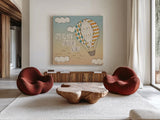 Up Up and Away Adventure Teal by Laura Marshall. Shown as extra-large giant wall art in a modern living room. Available as an archival giclee rolled canvas, fine art paper, or poster print. SKU 38241a.