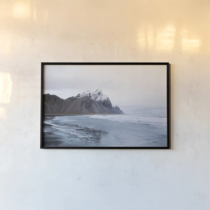 Vestrahorn by Laura Marshall. shown as a paper print in a black flame. Available as a archival giclee rolled canvas, fine art paper, or poster print. SKU 53846i.