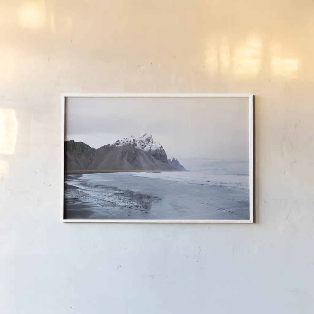 Vestrahorn by Laura Marshall. shown as a paper print in a white frame. Available as a archival giclee rolled canvas, fine art paper, or poster print. SKU 53846i.