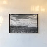 Virgin Mountains I by Laura Marshall. shown as a paper print in a black flame. Available as a archival giclee rolled canvas, fine art paper, or poster print. SKU 64420i.