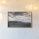 Virgin Mountains I by Laura Marshall. shown as a paper print in a natural frame. Available as a archival giclee rolled canvas, fine art paper, or poster print. SKU 64420i.