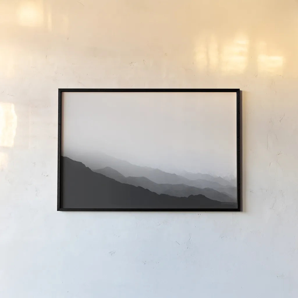 Virgin Mountains II by Laura Marshall. shown as a paper print in a black flame. Available as a archival giclee rolled canvas, fine art paper, or poster print. SKU 64421i.