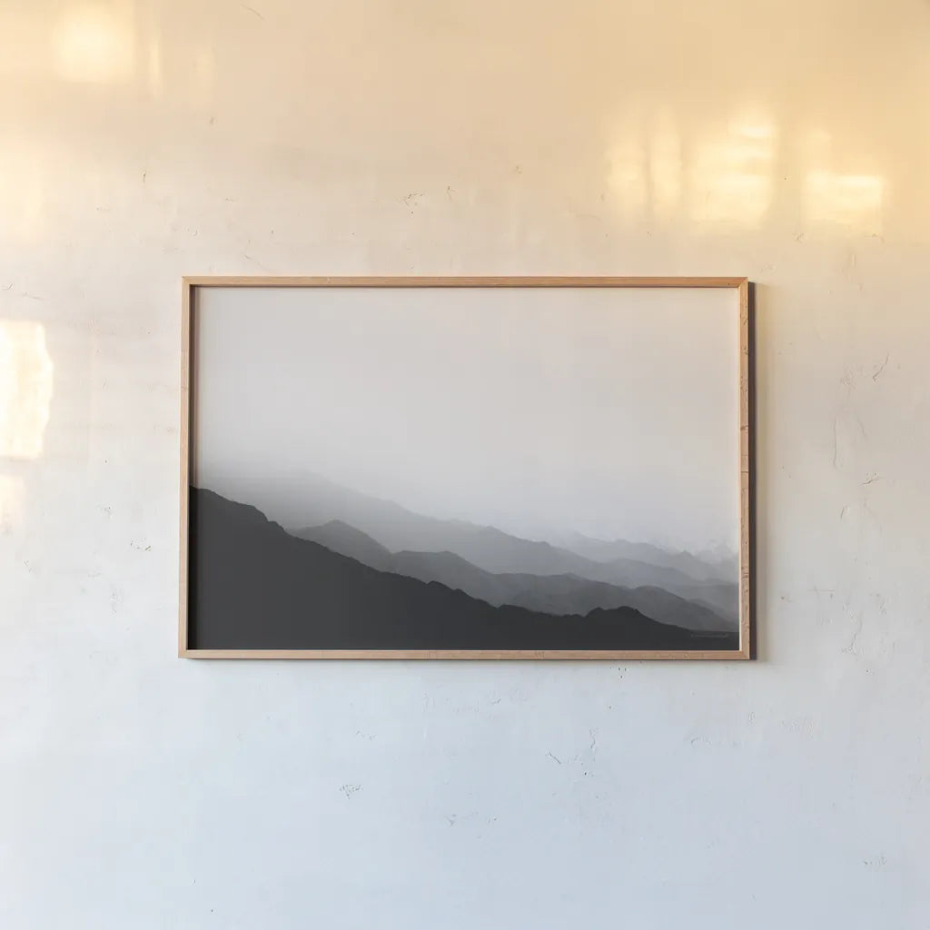 Virgin Mountains II by Laura Marshall. shown as a paper print in a natural frame. Available as a archival giclee rolled canvas, fine art paper, or poster print. SKU 64421i.