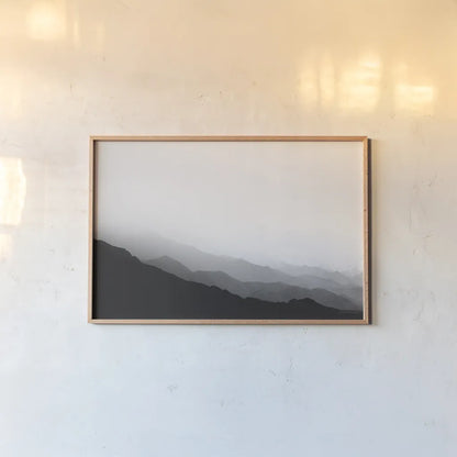 Virgin Mountains II by Laura Marshall. shown as a paper print in a natural frame. Available as a archival giclee rolled canvas, fine art paper, or poster print. SKU 64421i.