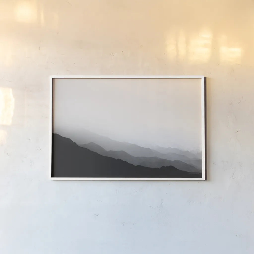Virgin Mountains II by Laura Marshall. shown as a paper print in a white frame. Available as a archival giclee rolled canvas, fine art paper, or poster print. SKU 64421i.