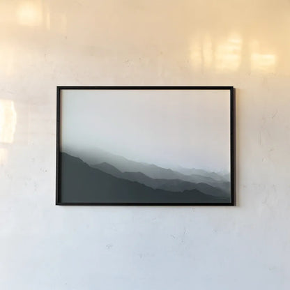 Virgin Mountains II Blue Gray by Laura Marshall. shown as a paper print in a black flame. Available as a archival giclee rolled canvas, fine art paper, or poster print. SKU 79233i.