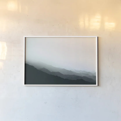 Virgin Mountains II Blue Gray by Laura Marshall. shown as a paper print in a white frame. Available as a archival giclee rolled canvas, fine art paper, or poster print. SKU 79233i.