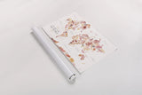Warm Desert Blooms Map by Laura Marshall. shown as a rolled paper print. Available as archival giclee rolled canvas, fine art paper, or poster print. SKU 66492i.