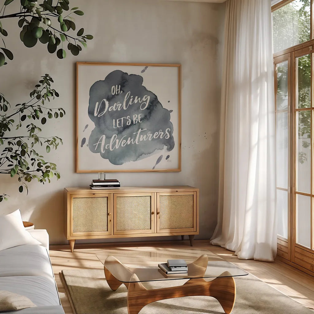 Watercolor Wanderlust Adventure I by Laura Marshall. Shown in a natural wood frame in a cozy modern living room. Available as an archival giclee rolled canvas, fine art paper, or poster print. SKU 36867a.