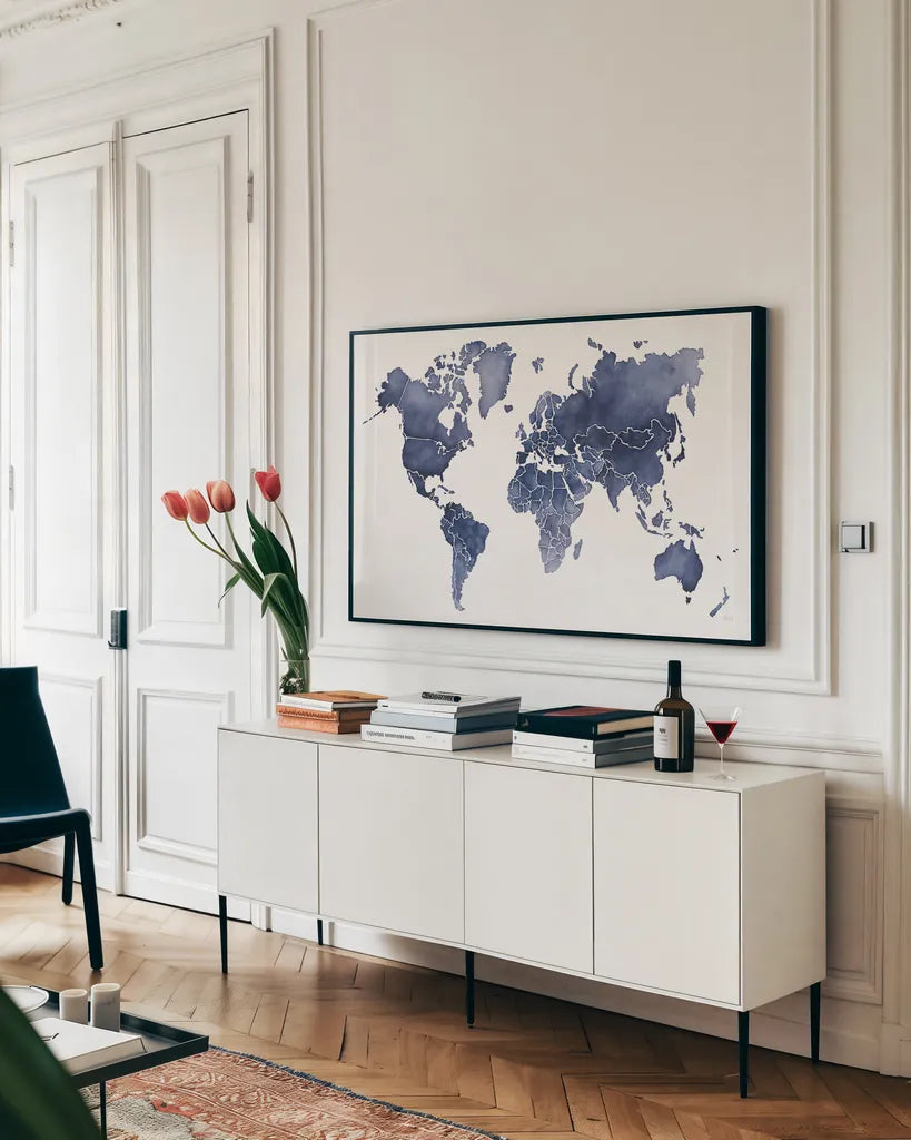 Watercolor Wanderlust Indigo by Laura Marshall. shown as a framed stretched canvas in a living room above a console. Available as a archival giclee rolled canvas, fine art paper, or poster print. SKU 50562i.
