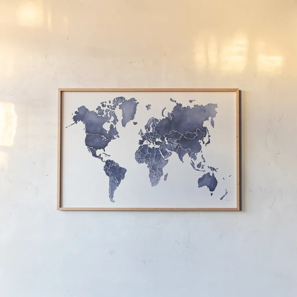 Watercolor Wanderlust Indigo by Laura Marshall. shown as a paper print in a natural frame. Available as a archival giclee rolled canvas, fine art paper, or poster print. SKU 50562i.