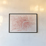 Watercolor Wanderlust London Coral by Laura Marshall. shown as a paper print in a black flame. Available as a archival giclee rolled canvas, fine art paper, or poster print. SKU 50415i.