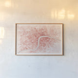 Watercolor Wanderlust London Coral by Laura Marshall. shown as a paper print in a natural frame. Available as a archival giclee rolled canvas, fine art paper, or poster print. SKU 50415i.