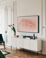 Watercolor Wanderlust Paris Coral by Laura Marshall. shown as a framed stretched canvas in a living room above a console. Available as a archival giclee rolled canvas, fine art paper, or poster print. SKU 50414i.