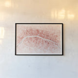 Watercolor Wanderlust Paris Coral by Laura Marshall. shown as a paper print in a black flame. Available as a archival giclee rolled canvas, fine art paper, or poster print. SKU 50414i.