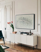 Watercolor Wanderlust Paris Mint by Laura Marshall. shown as a framed stretched canvas in a living room above a console. Available as a archival giclee rolled canvas, fine art paper, or poster print. SKU 50412i.