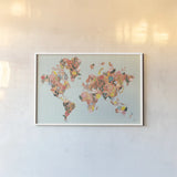 Wild Garden World by Laura Marshall. shown as a paper print in a white frame. Available as a archival giclee rolled canvas, fine art paper, or poster print. SKU 49066i.