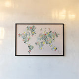 Wild Garden World Blush by Laura Marshall. shown as a paper print in a black flame. Available as a archival giclee rolled canvas, fine art paper, or poster print. SKU 50409i.