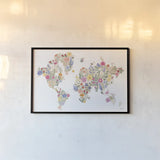 Wild Meadow World by Laura Marshall. shown as a paper print in a black flame. Available as a archival giclee rolled canvas, fine art paper, or poster print. SKU 79367i.