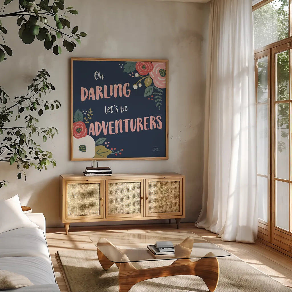 Wildflower Daydreams V Navy by Laura Marshall. Shown in a natural wood frame in a cozy modern living room. Available as an archival giclee rolled canvas, fine art paper, or poster print. SKU 35997a.