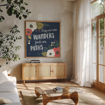 Wildflower Daydreams VI Navy by Laura Marshall. Shown in a natural wood frame in a cozy modern living room. Available as an archival giclee rolled canvas, fine art paper, or poster print. SKU 35998a.