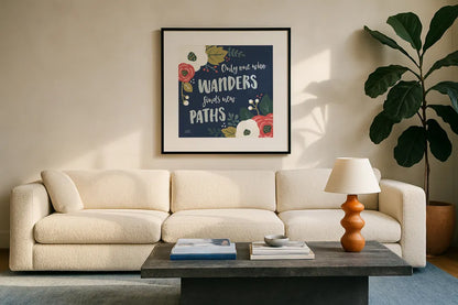 Wildflower Daydreams VI Navy by Laura Marshall. Displayed in a glass frame with matte in a clean modern living room. Available as an archival giclee rolled canvas, fine art paper, or poster print. SKU 35998a.