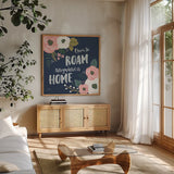 Wildflower Daydreams VII Navy by Laura Marshall. Shown in a natural wood frame in a cozy modern living room. Available as an archival giclee rolled canvas, fine art paper, or poster print. SKU 35999a.