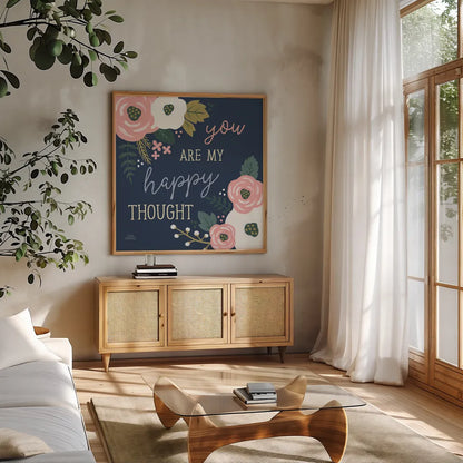 Wildflower Daydreams VII Navy Happy by Laura Marshall. Shown in a natural wood frame in a cozy modern living room. Available as an archival giclee rolled canvas, fine art paper, or poster print. SKU 36382a.