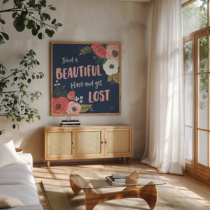 Wildflower Daydreams VIII Navy by Laura Marshall. Shown in a natural wood frame in a cozy modern living room. Available as an archival giclee rolled canvas, fine art paper, or poster print. SKU 36000a.