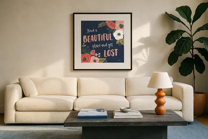 Wildflower Daydreams VIII Navy by Laura Marshall. Displayed in a glass frame with matte in a clean modern living room. Available as an archival giclee rolled canvas, fine art paper, or poster print. SKU 36000a.