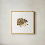 Woodland Whimsy Hedgehog by Laura Marshall. Shown in a natural wood glass frame for a timeless modern aesthetic. Available as an archival giclee rolled canvas, fine art paper, or poster print. SKU 58882a.
