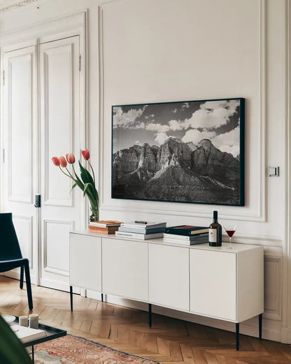 Zion Canyon I by Laura Marshall. shown as a framed stretched canvas in a living room above a console. Available as a archival giclee rolled canvas, fine art paper, or poster print. SKU 64422i.