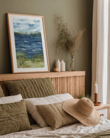 Across the Cape by Leslie Trimbach. shown as a paper print in a natural frame. Available as a archival giclee rolled canvas, fine art paper, or poster print. SKU 86623h.