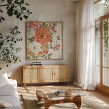 Amber Blossoms III by Leslie Trimbach. Shown in a natural wood frame in a cozy modern living room. Available as an archival giclee rolled canvas, fine art paper, or poster print. SKU 99302a.