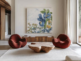 Blue Botanica V by Leslie Trimbach. Shown as extra-large giant wall art in a modern living room. Available as an archival giclee rolled canvas, fine art paper, or poster print. SKU 100418a.
