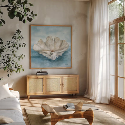 Coastal Calm IV by Leslie Trimbach. Shown in a natural wood frame in a cozy modern living room. Available as an archival giclee rolled canvas, fine art paper, or poster print. SKU 102015a.